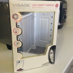 Brand new still in box never used LED light up makeup mirror rose gold